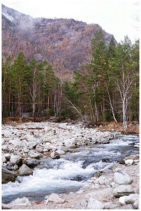 Serene mountain stream flowing through Arshan, Bur