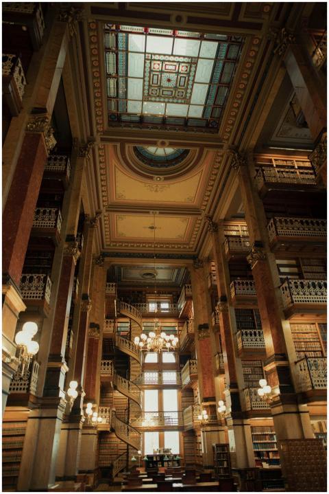 Majestic library interior featuring ornate columns