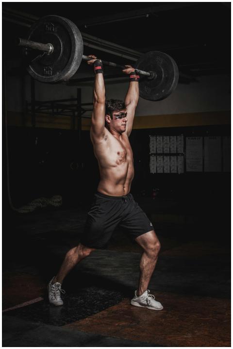 Shirtless man demonstrating strength and fitness b
