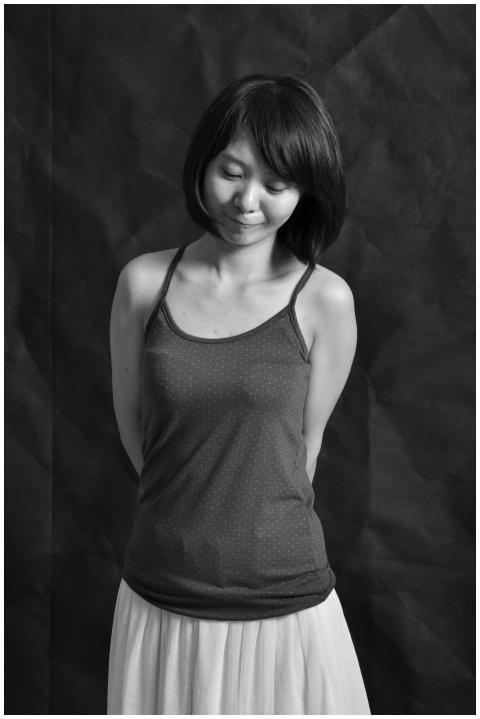 Elegant black and white portrait of a young woman