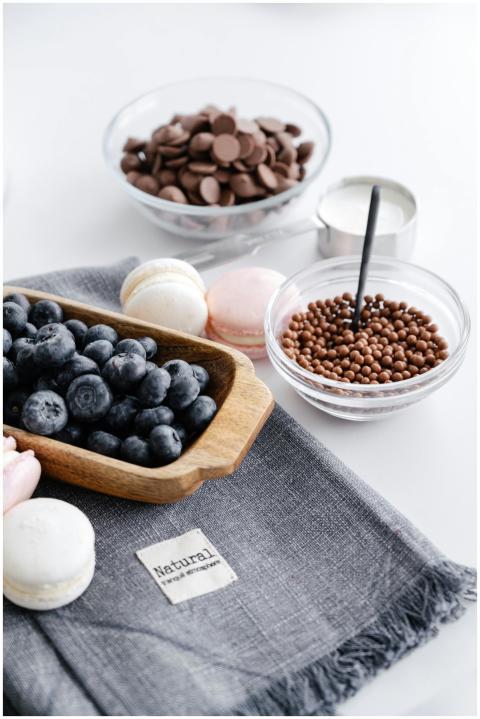 A stylish food display featuring blueberries, choc