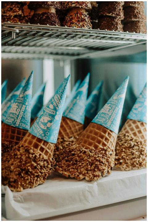 Close-up of chocolate-dipped ice cream cones with