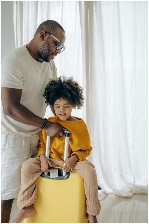 A father shares a joyful play session with his chi
