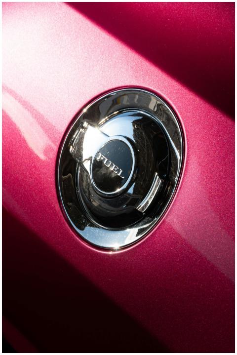 Detailed view of a shiny chrome fuel tank cap on a