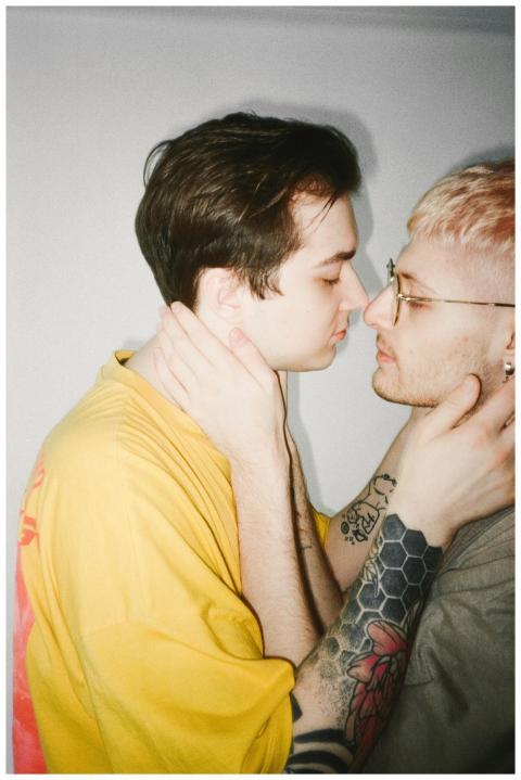 A close-up of a loving couple embracing, showcasin