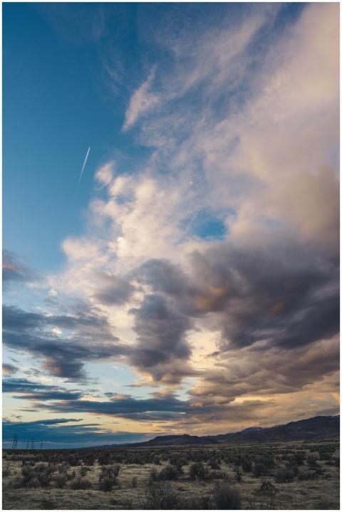 A beautiful dramatic sky with clouds over a desert