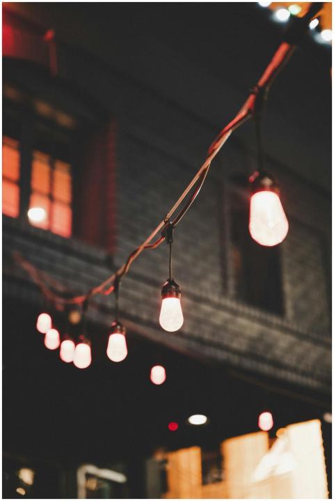 Cozy string lights illuminating an urban outdoor n