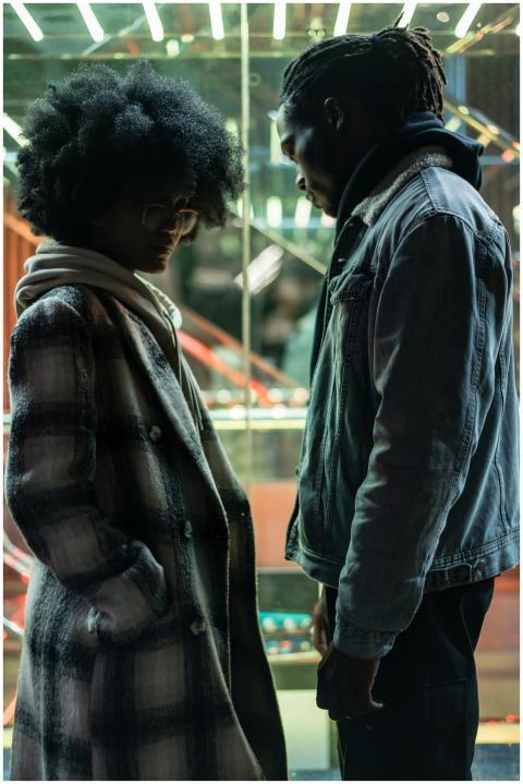 Side view of displease African American couple hav