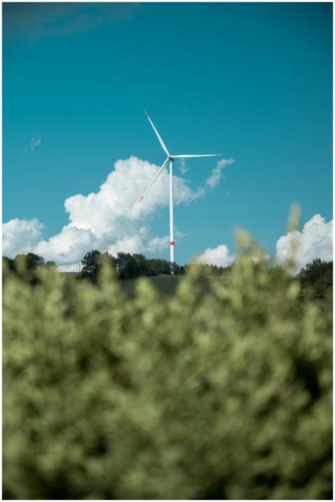 Wind turbine against a blue sky and clouds in Zlat