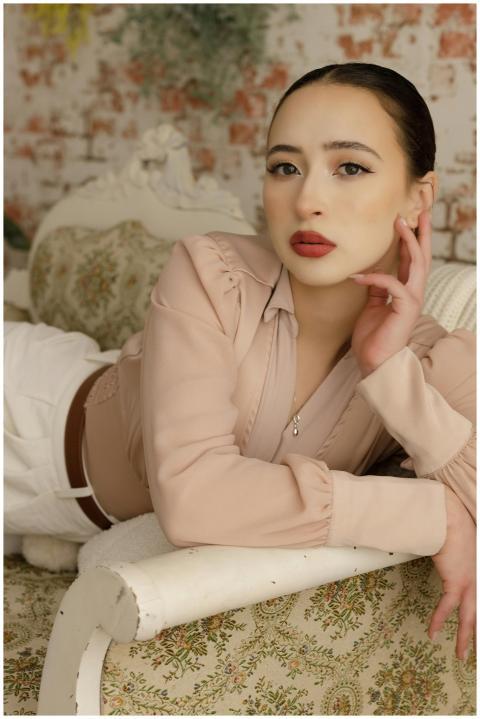 Elegant Woman Relaxing Indoors