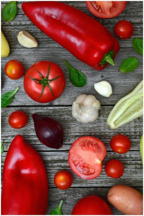 Vibrant fresh vegetables including tomatoes, peppe