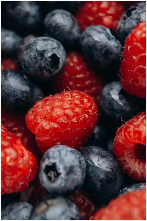 Vibrant close-up of fresh blueberries and raspberr