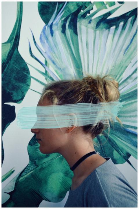 Profile of a woman with paint stroke over eyes, ag