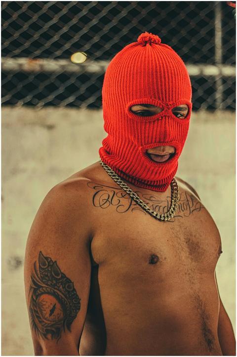 A bold street fashion portrait of a man wearing a