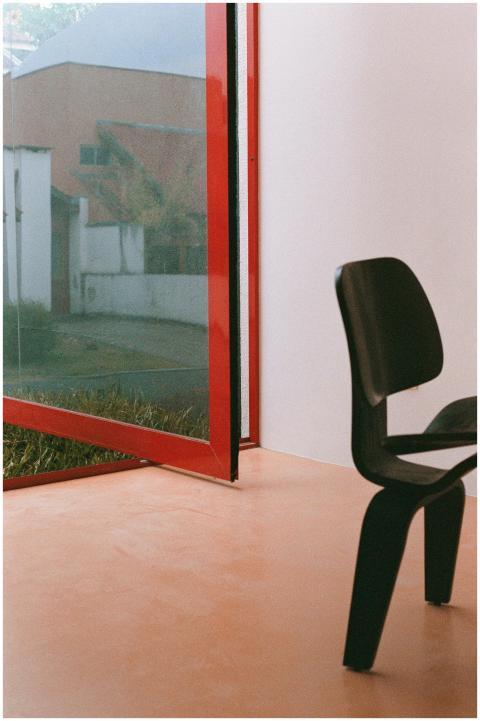 Stylish modern interior featuring a black chair an