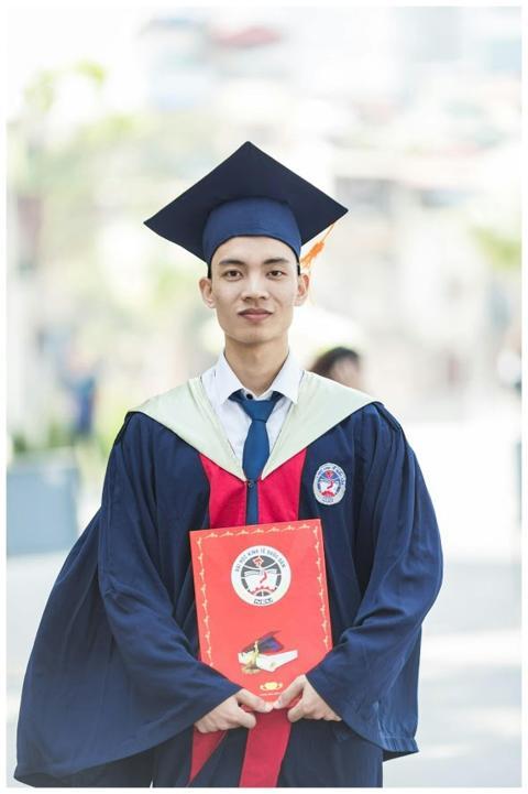 Proud graduate in academic gown holding diploma, c