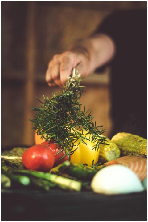 A vibrant assortment of fresh vegetables and herbs