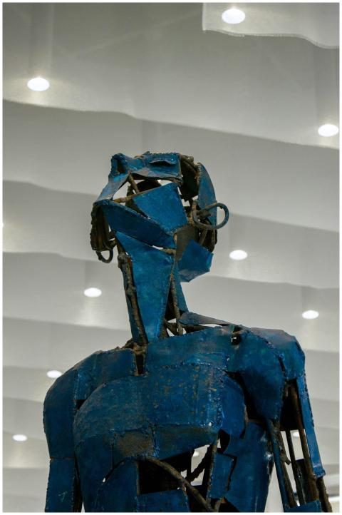 Intriguing blue metal sculpture displayed in Bishk