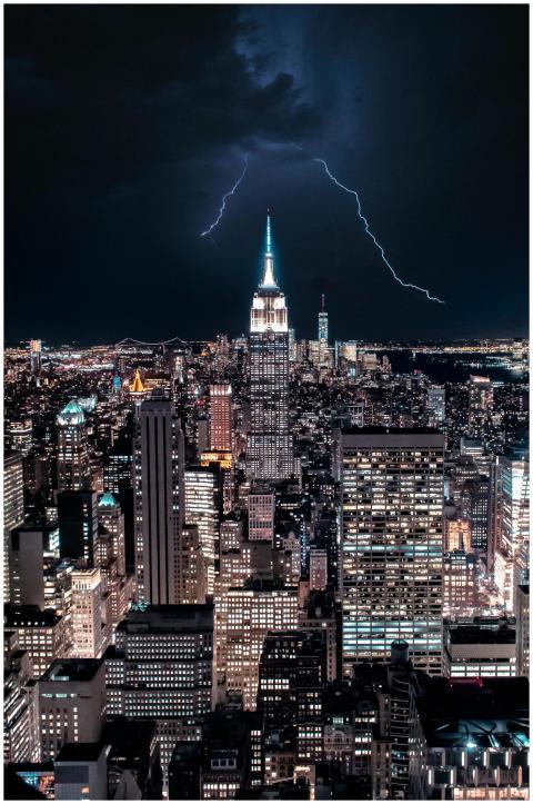 Dramatic view of NY skyline with lightning strikin