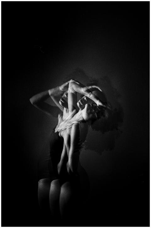 A black and white double exposure photograph of a