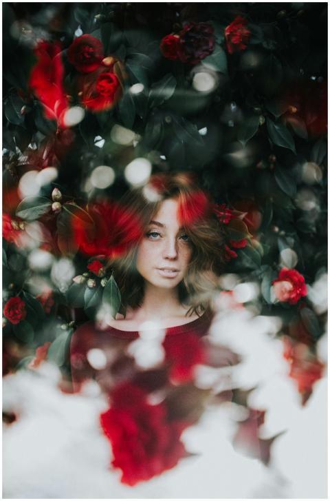 Double exposure portrait of a woman surrounded by