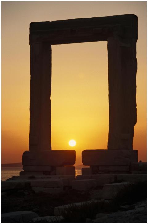 Beautiful sunset view through the Portara on Naxos