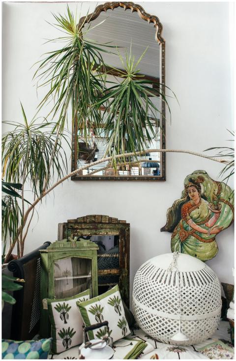 Beautiful boho interior featuring lush indoor plan