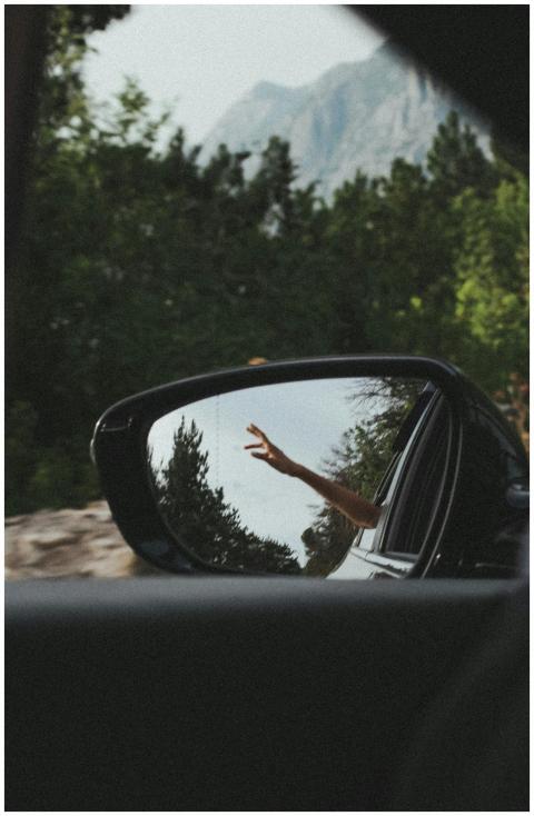 A relaxing drive in a car, capturing the scenic mo