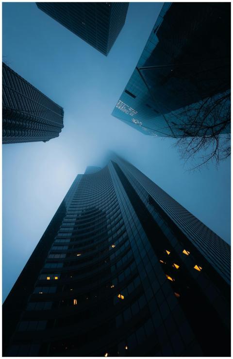 Capturing the dramatic view of skyscrapers in fog,
