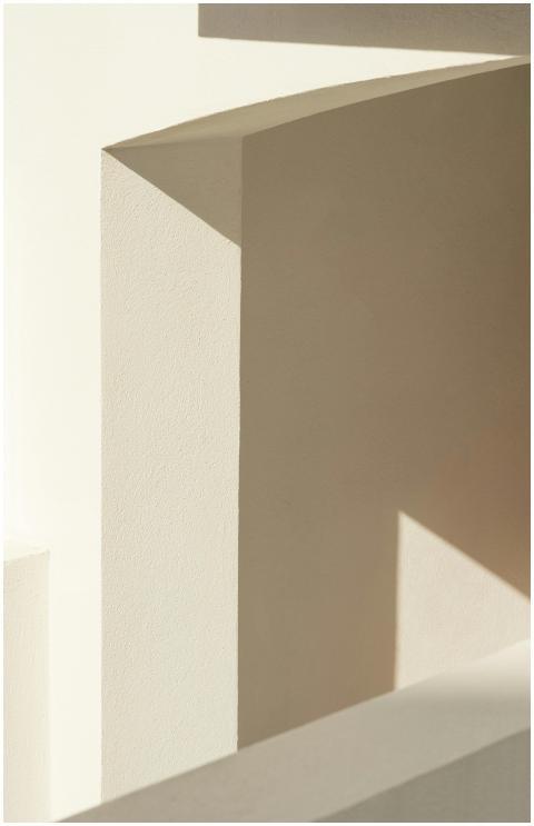 A minimalist image showcasing light and shadow on