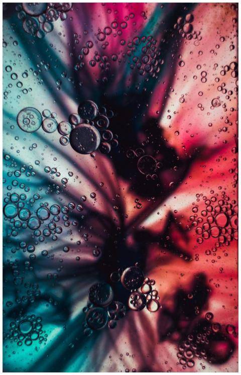 Vibrant abstract art of floating bubbles in multic