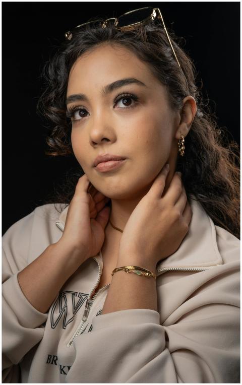 A serene portrait of a woman with thoughtful expre