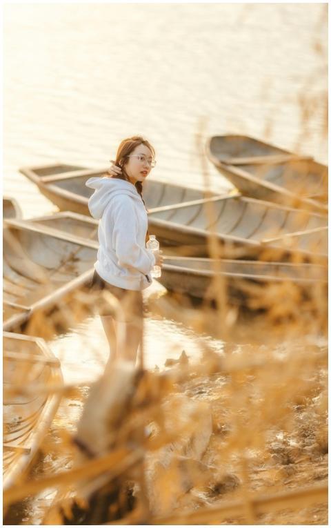 Young Woman Wooden Boats