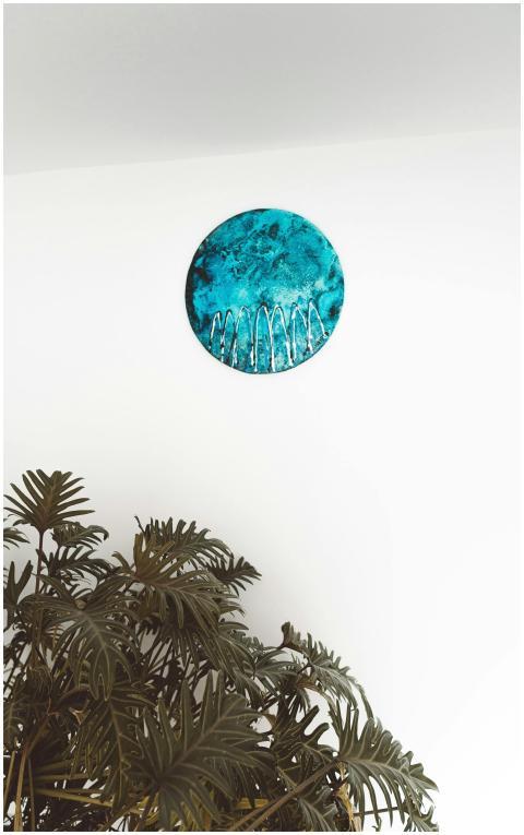 Abstract wall art with turquoise circle and plant