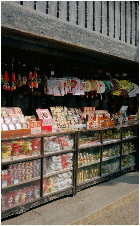 Colorful display of traditional Asian souvenirs in