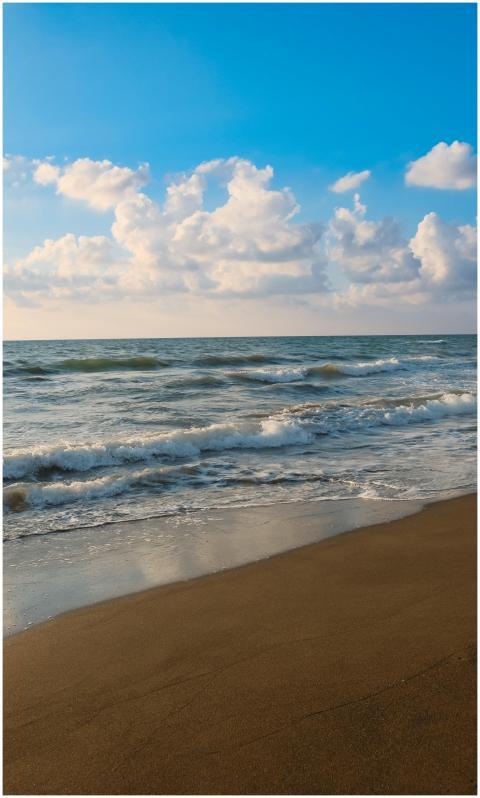 Tranquil beach with waves in İskenderun, Türkiye,
