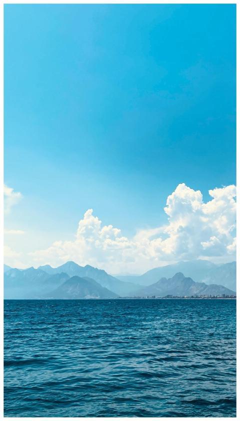 Beautiful panoramic view of a sea with mountains a