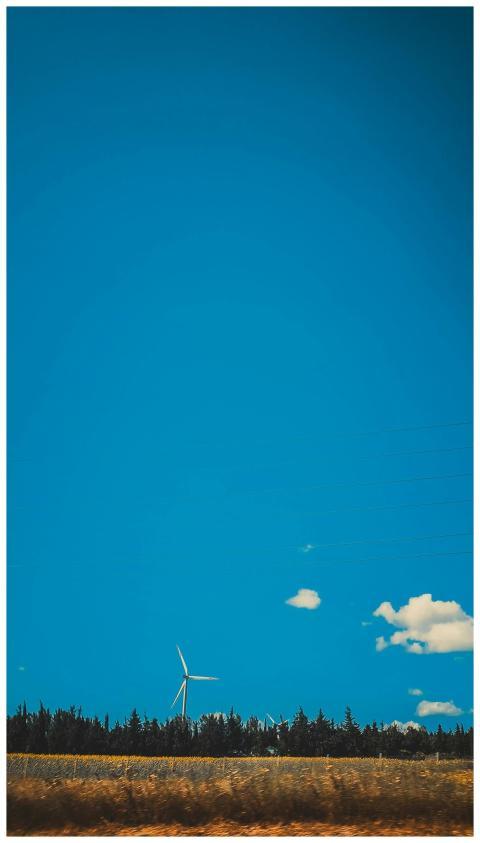 Wind turbine against a deep blue sky in Silivri, I