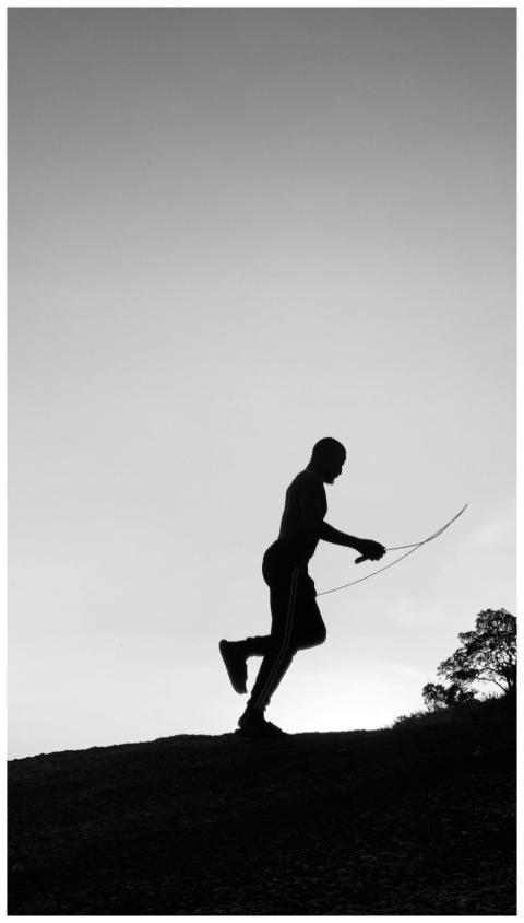 Silhouette Man Jumping Rope