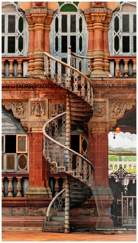 Intricate spiral staircase on a historic Indian pa