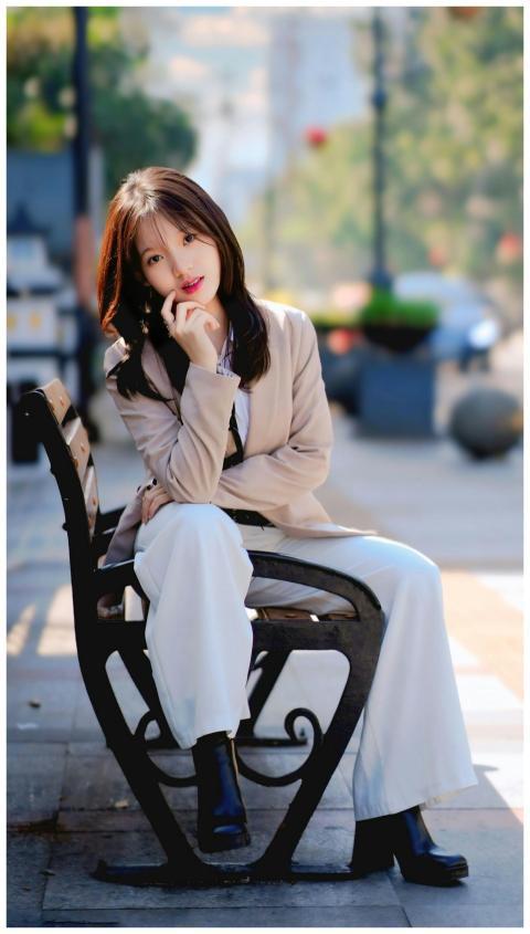 Stylish Woman Sitting Bench