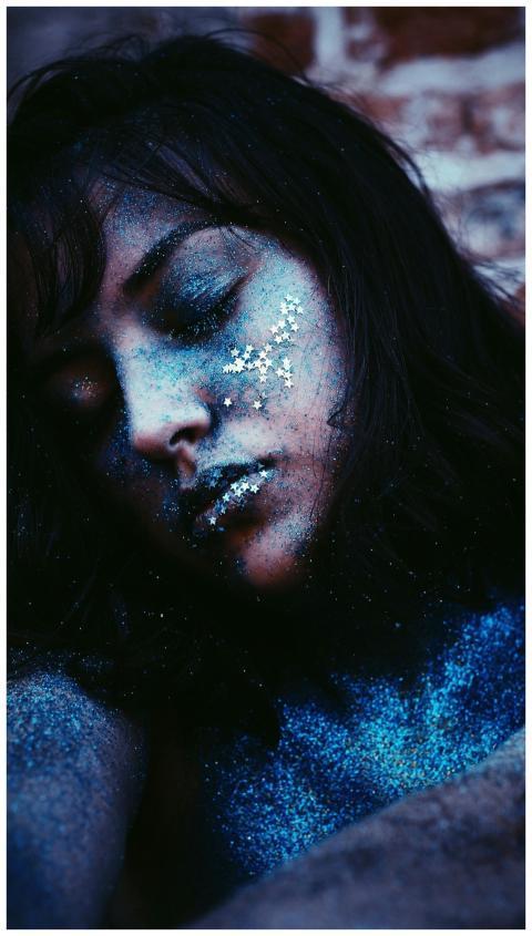 Enchanting close-up portrait of a woman adorned wi