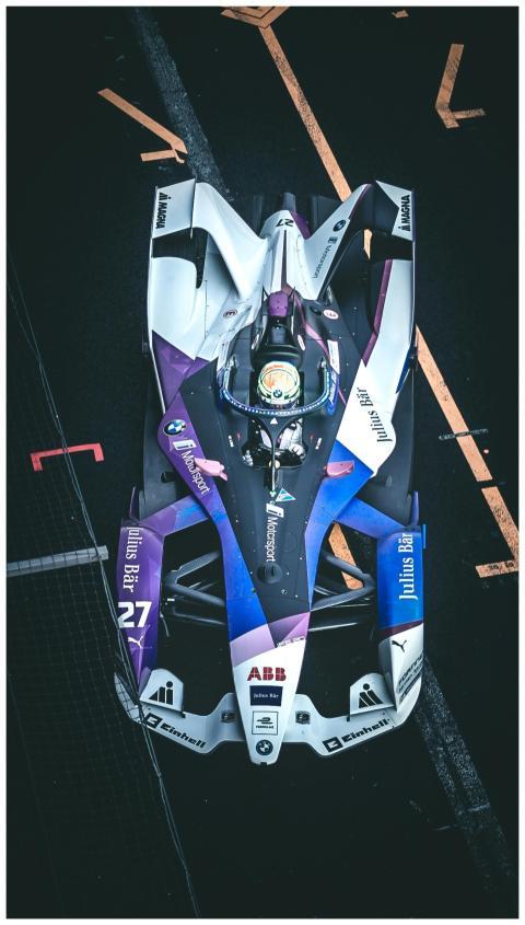 Dynamic shot of a Formula E race car on track in C