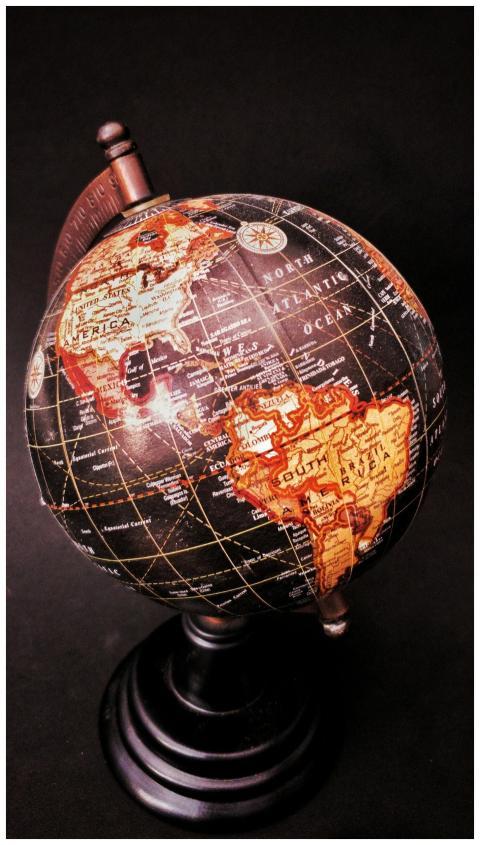 Close-up of a vintage globe showcasing the America