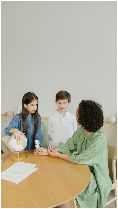 Kids engaging with a teacher in a lesson on sustai