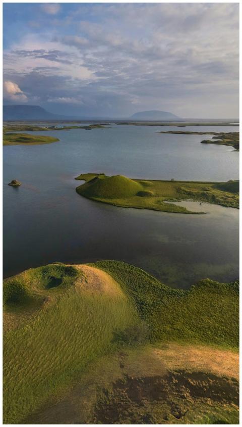 Capture of a serene lake landscape with lush green