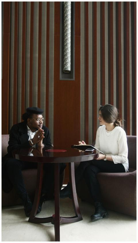 A business meeting between two professionals in a