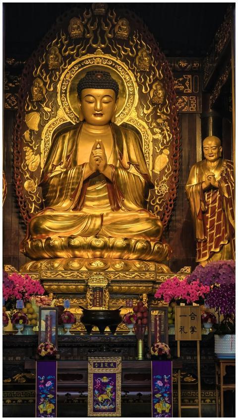 Golden Buddha statue in a Xi'an temple, showcasing