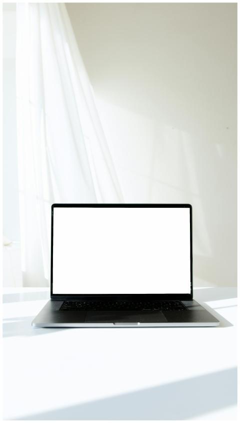 Minimalist mockup of a modern laptop with a white