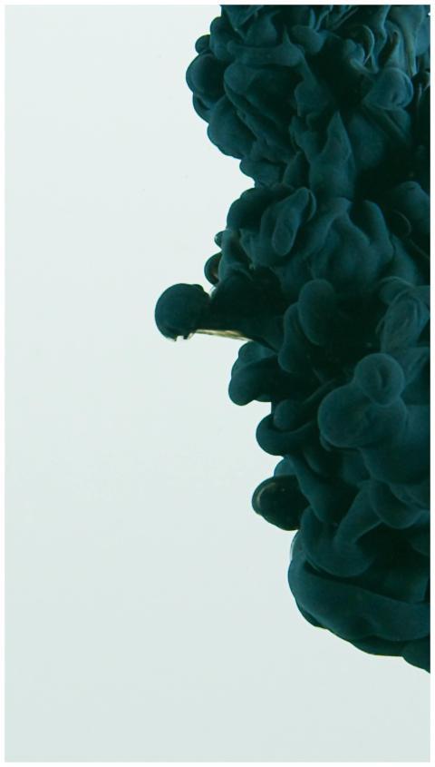 Intricate dark ink cloud flowing in liquid, creati